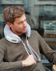 Man using Breo iNeck 3 Pro neck massager for outdoor relaxation Breo iNeck 3 Pro Neck Massager - us.breo.com - best-breo-massagers